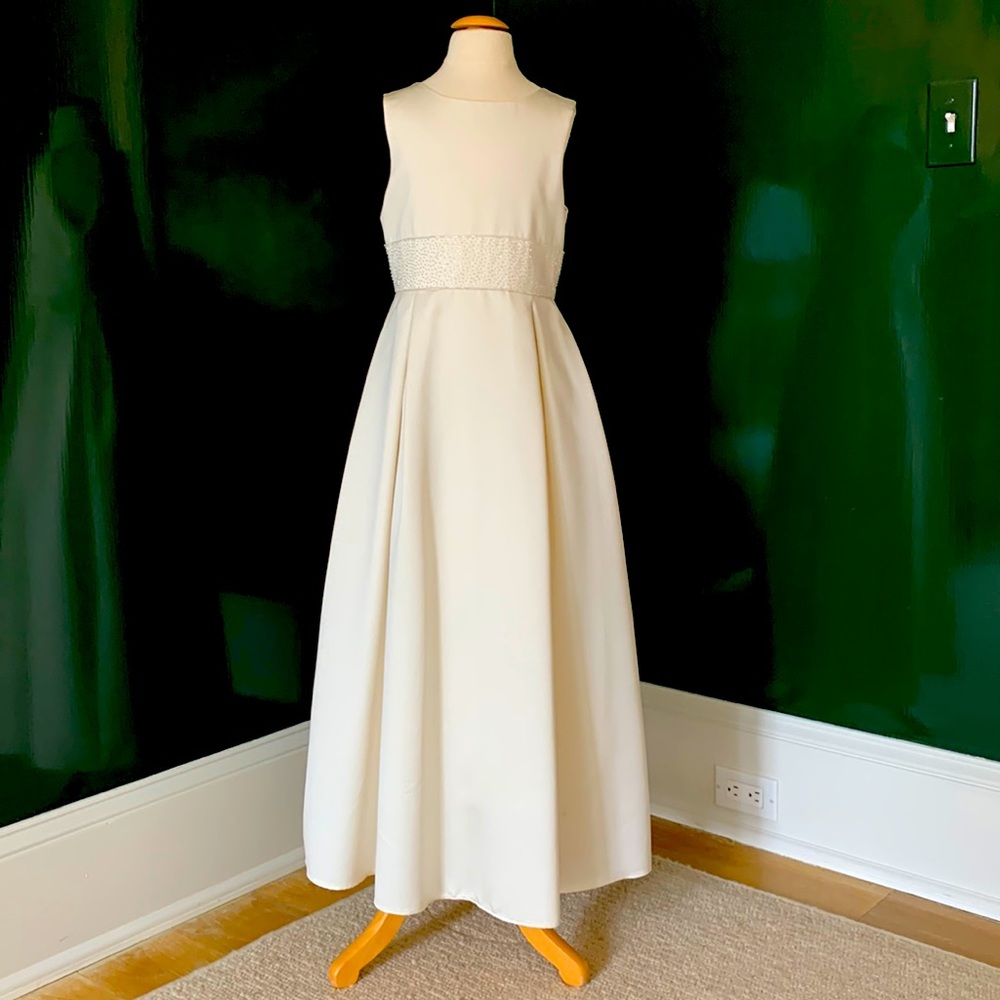 Girls Ivory sleeveless satin long dress. By Sweet Beginnings.